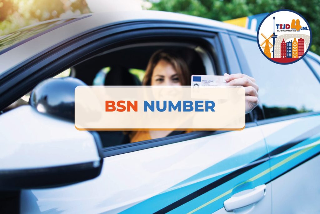 A woman holds a card showing her BSN number, which is required to living in the Netherlands